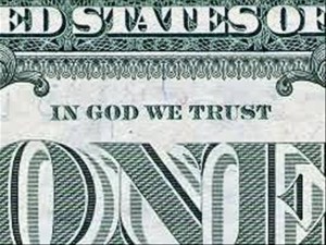dollar bill showing "In God We Trust"